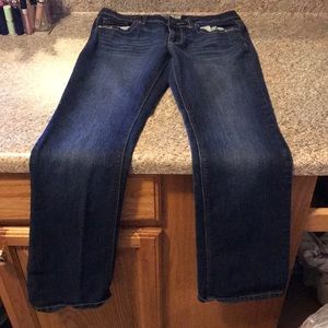 three pairs of jeans